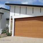 Timber Sectional Garage Door on the front of a house